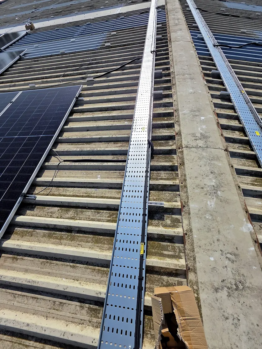 Cable tray run between array rows