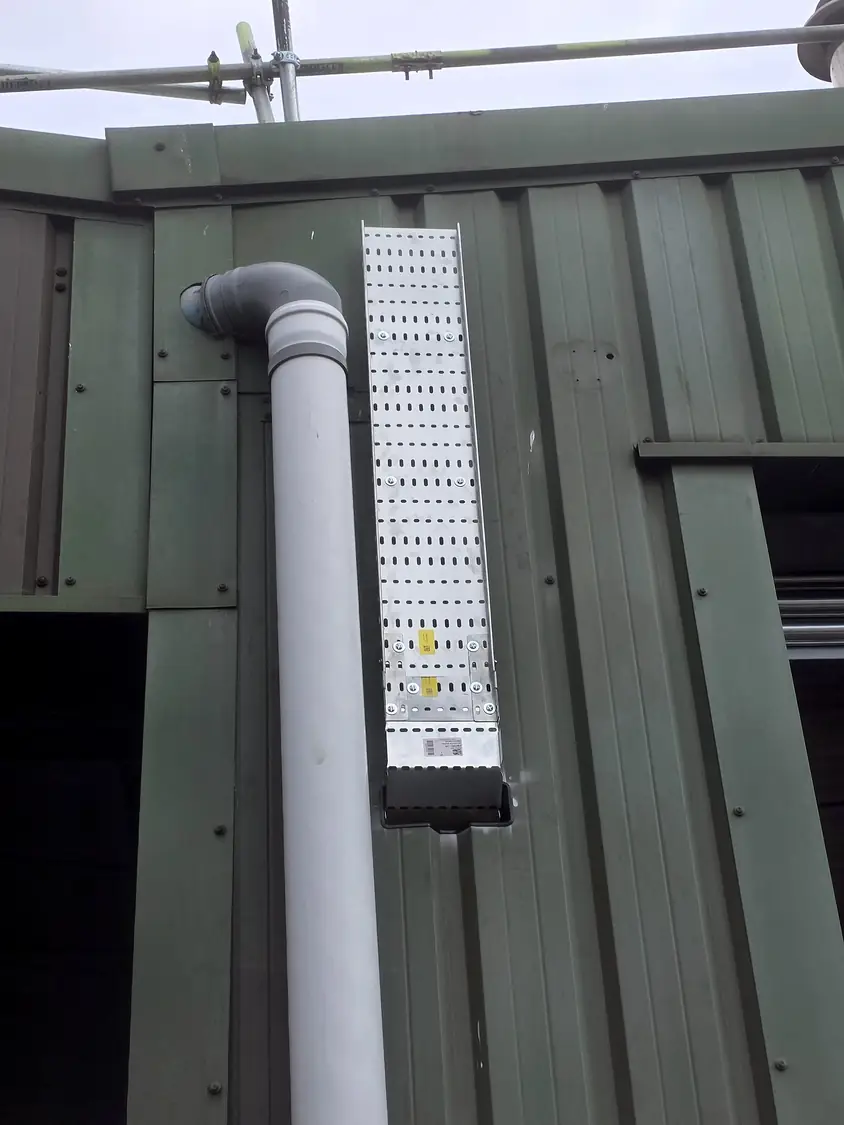 Cable tray down the building face