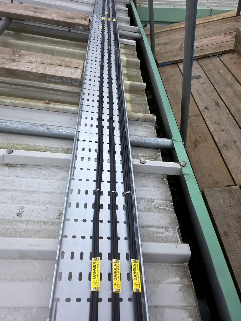 Labelled DC cable runs in tray