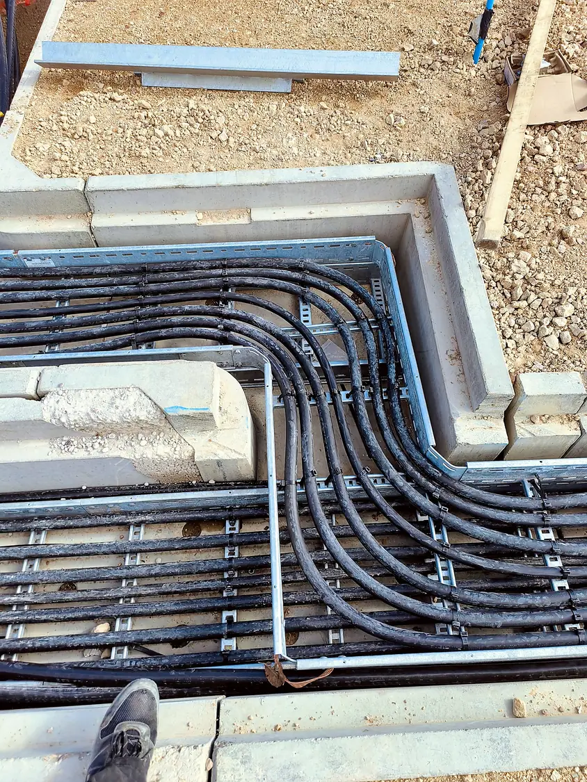 Cables formed through a trough junction