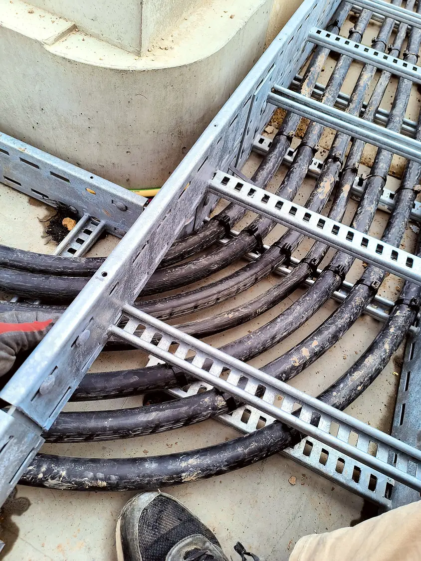 Cable ladder bridging the trough